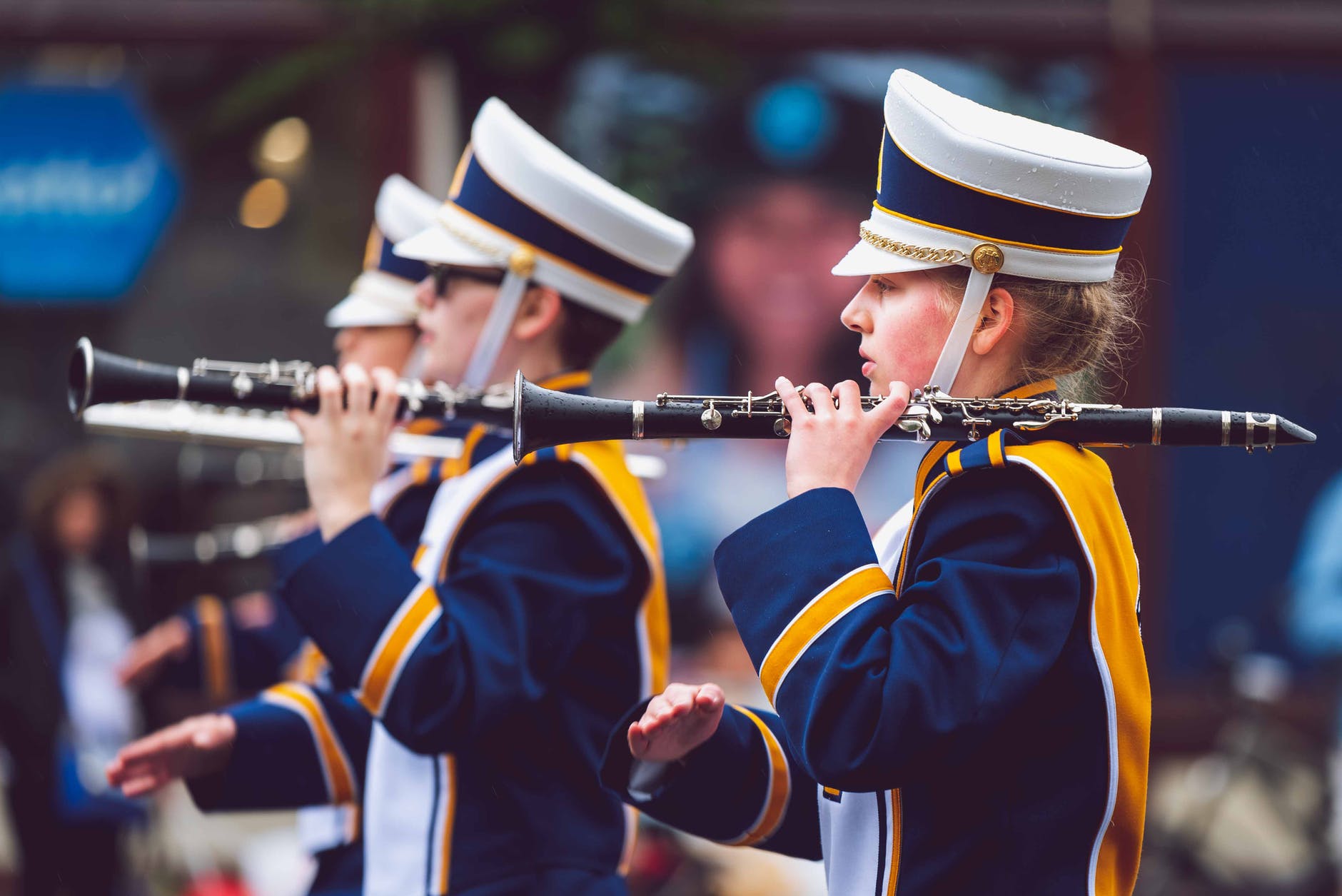 selective focus photography of people holding clarinets