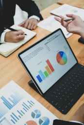 photo of ipad on top of wooden table